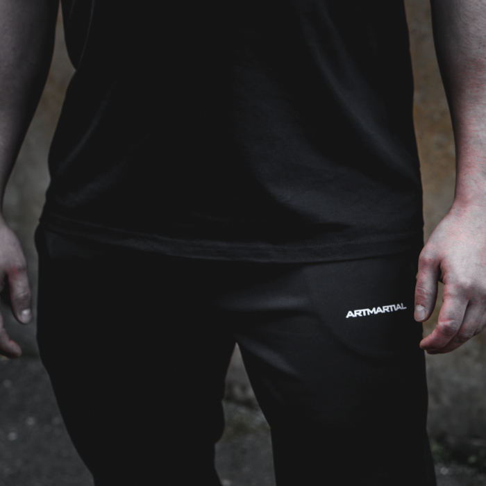 AM Logo Trackies